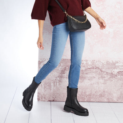 Boots Reign: Black Leather Sole Bliss USA